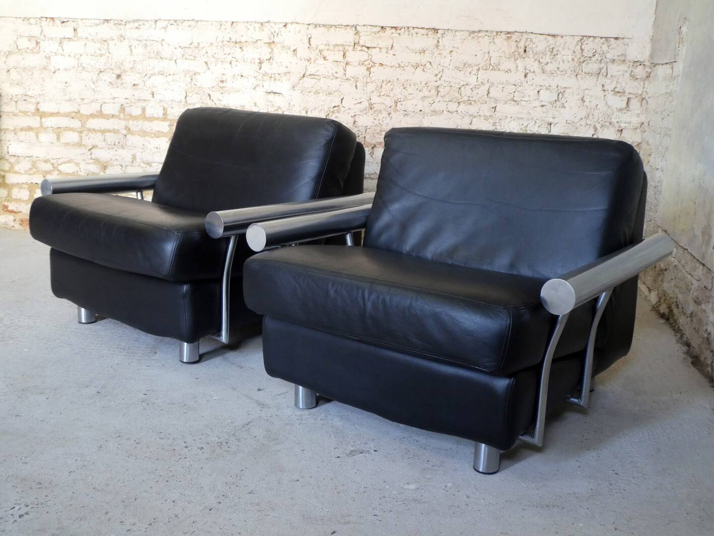 pair of armchairs, black leather & stainless steel, 1990