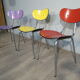 3 colored formica chairs