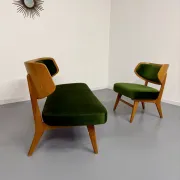 Sofa and armchair designed by Herta-Maria Witzemann, moulded wood, 1960s.