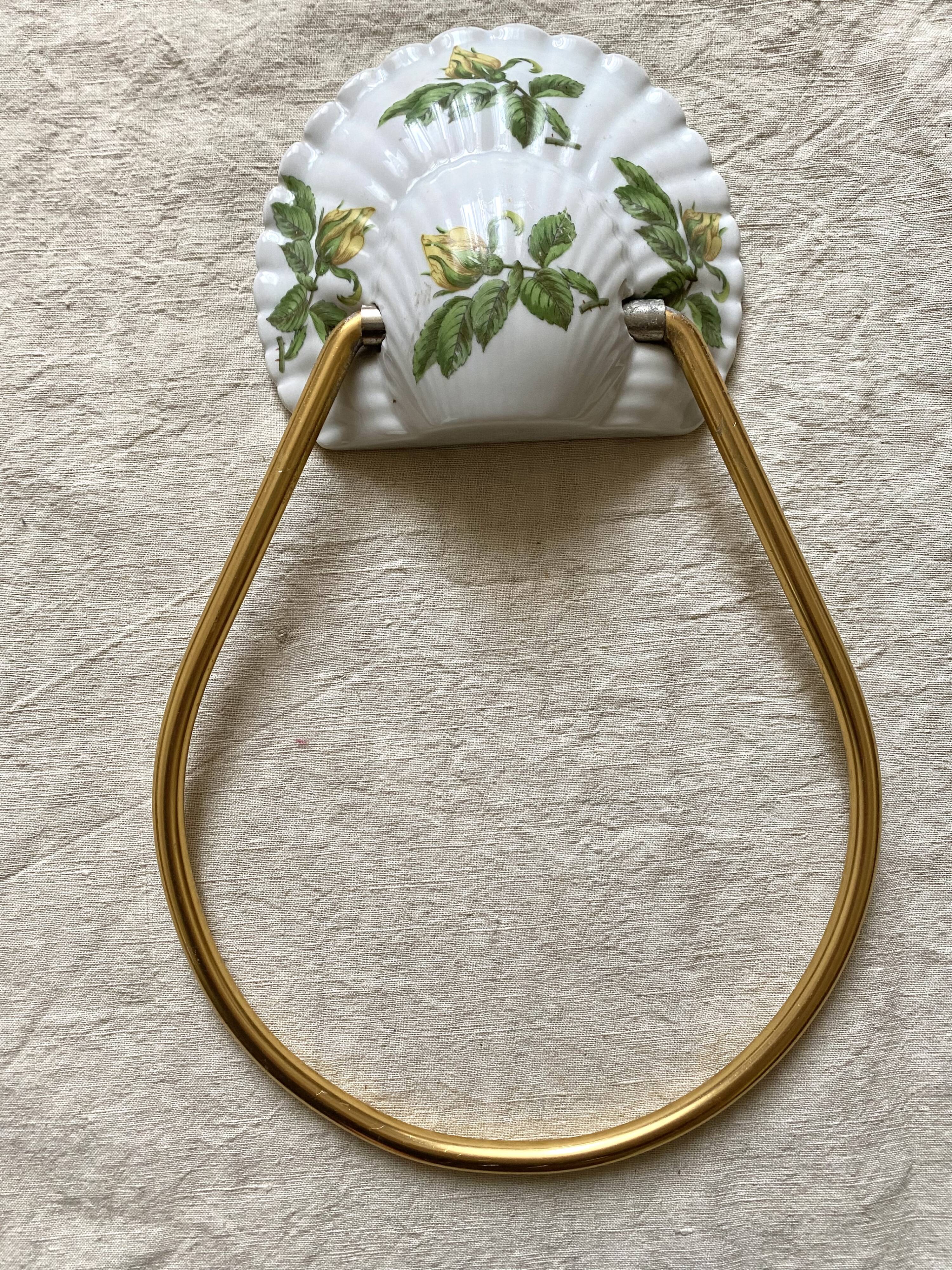 Old napkin holder in shell porcelain