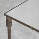 Table basse en laiton patiné et verre Maison Charles années 1960