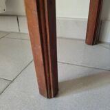 Antique campaign stool in solid wood with a straw seat.