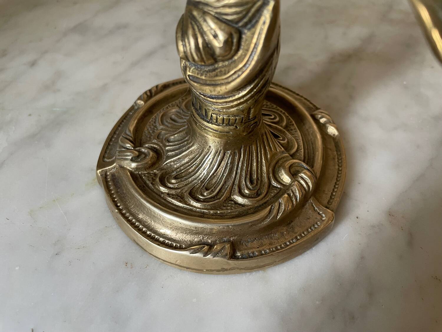 Pair of rocaille candlesticks in gilded bronze