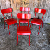 Set of 4 red metal chairs