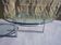 Chrome and glass tripod coffee table