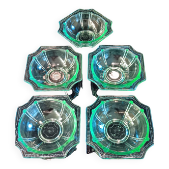 5 green transparent glass cups.