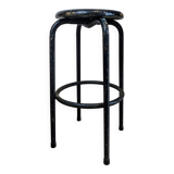 Old black industrial stool