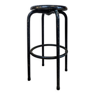 Old black industrial stool