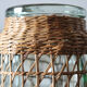 Glass and wicker vase
