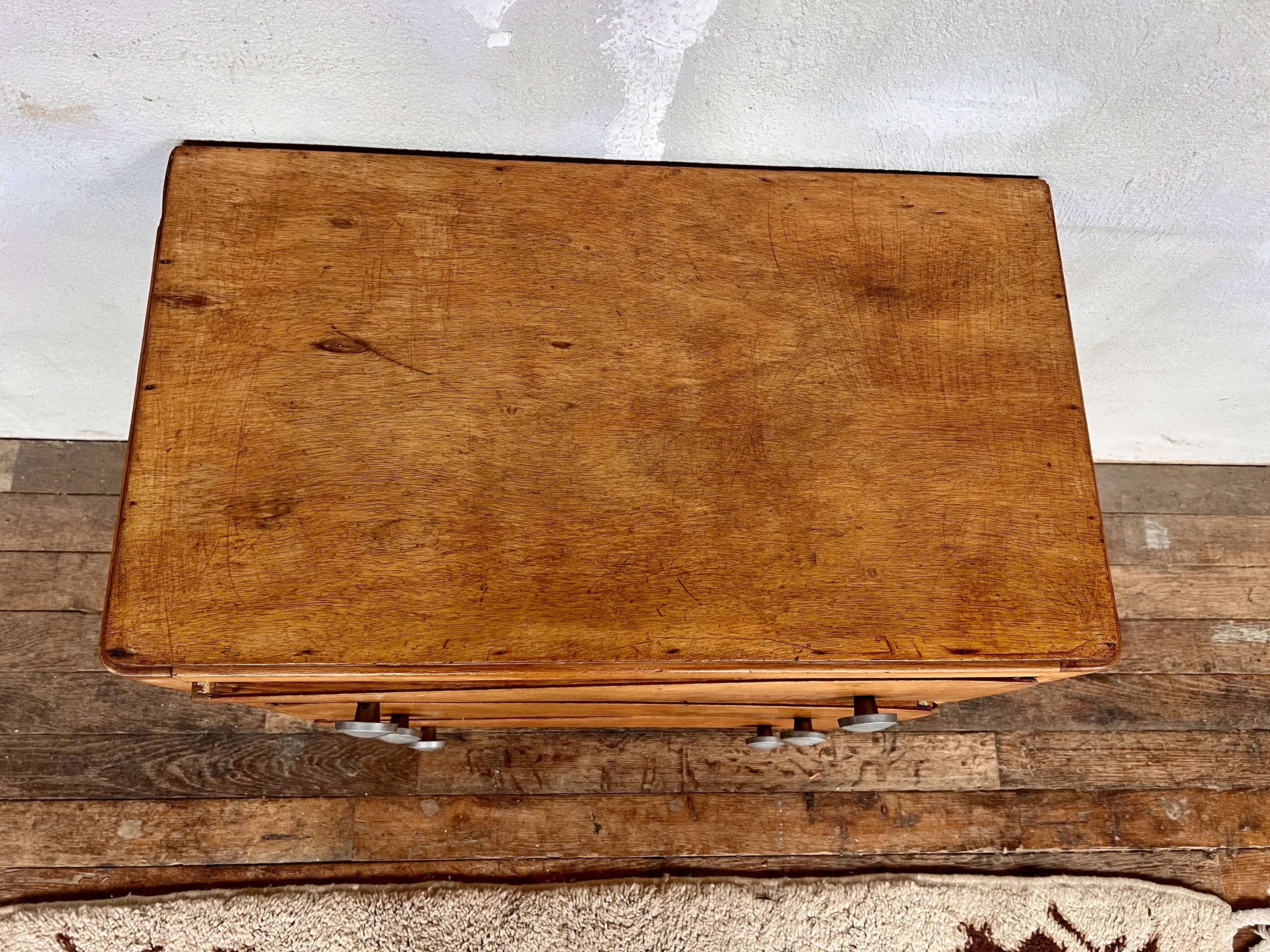 vintage art deco chest of drawers with compass feet