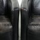 Set of two black vintage cowhide aviator design armchairs