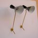 Vintage "Diabolo" wall apply in black metal and brass