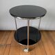 Vintage side table on wheels – black glass top