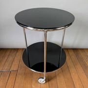 Vintage side table on wheels – black glass top