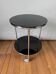 Vintage side table on wheels – black glass top