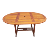 Stretchable garden dining table in solid teak