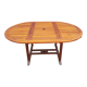 Stretchable garden dining table in solid teak