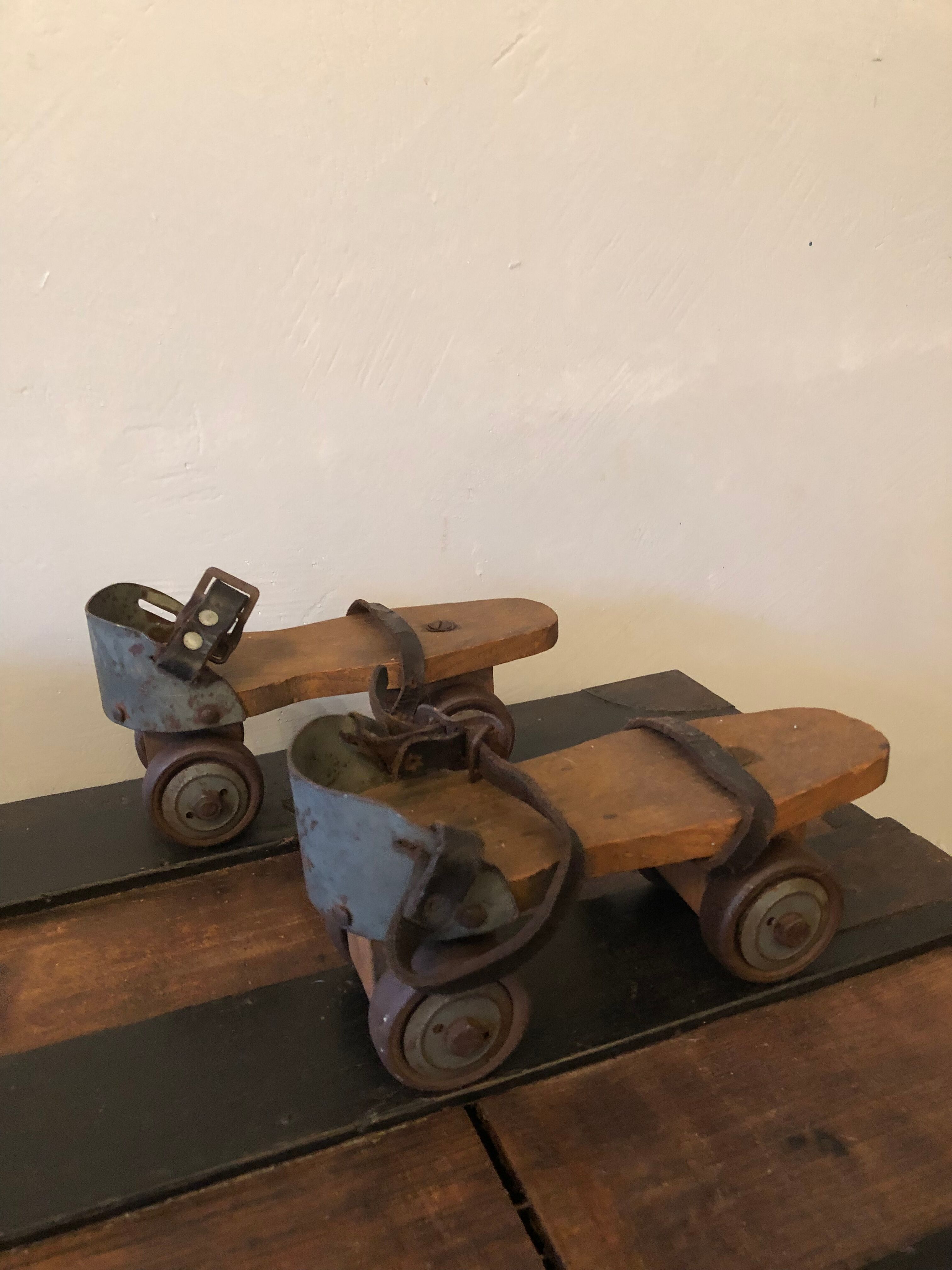Wooden and metal roller skates