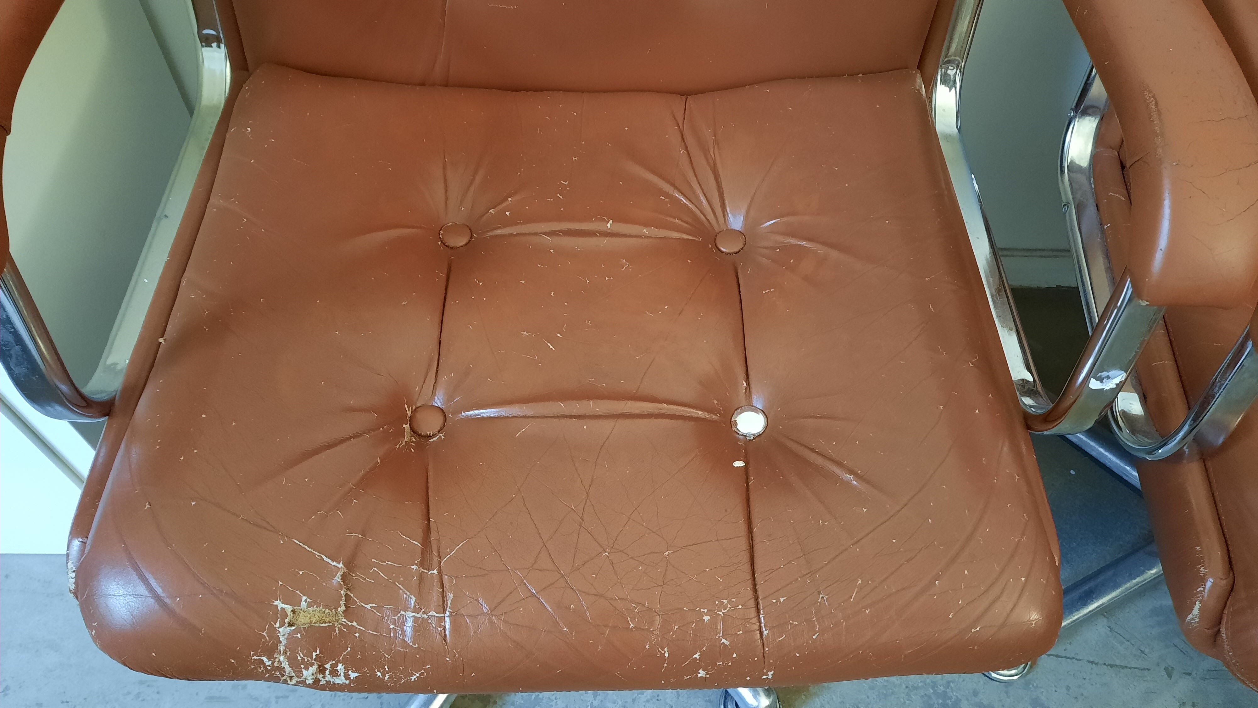 Brown leather armchairs