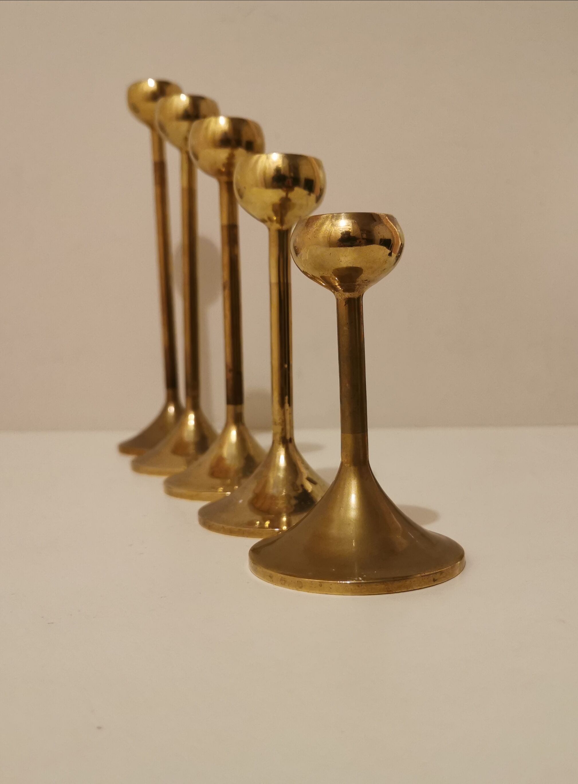Set of 5 brass candlesticks from the 70s