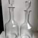 Pair of wine decanters in molded glass and engraved years 50-60