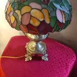 Antique bronze lamp and Tiffany-style stained glass shade. 46x32