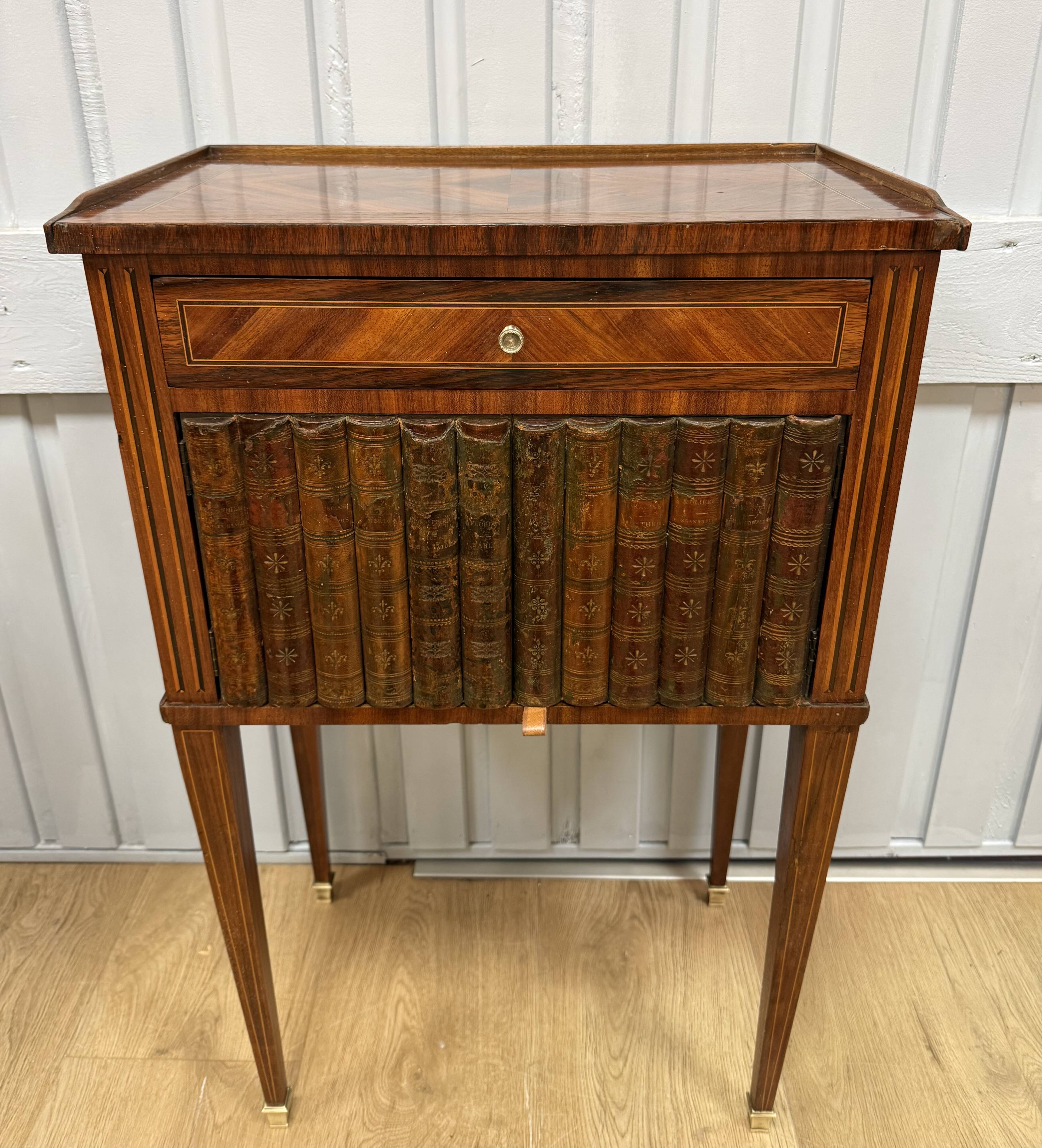 Side table with a faux book front.