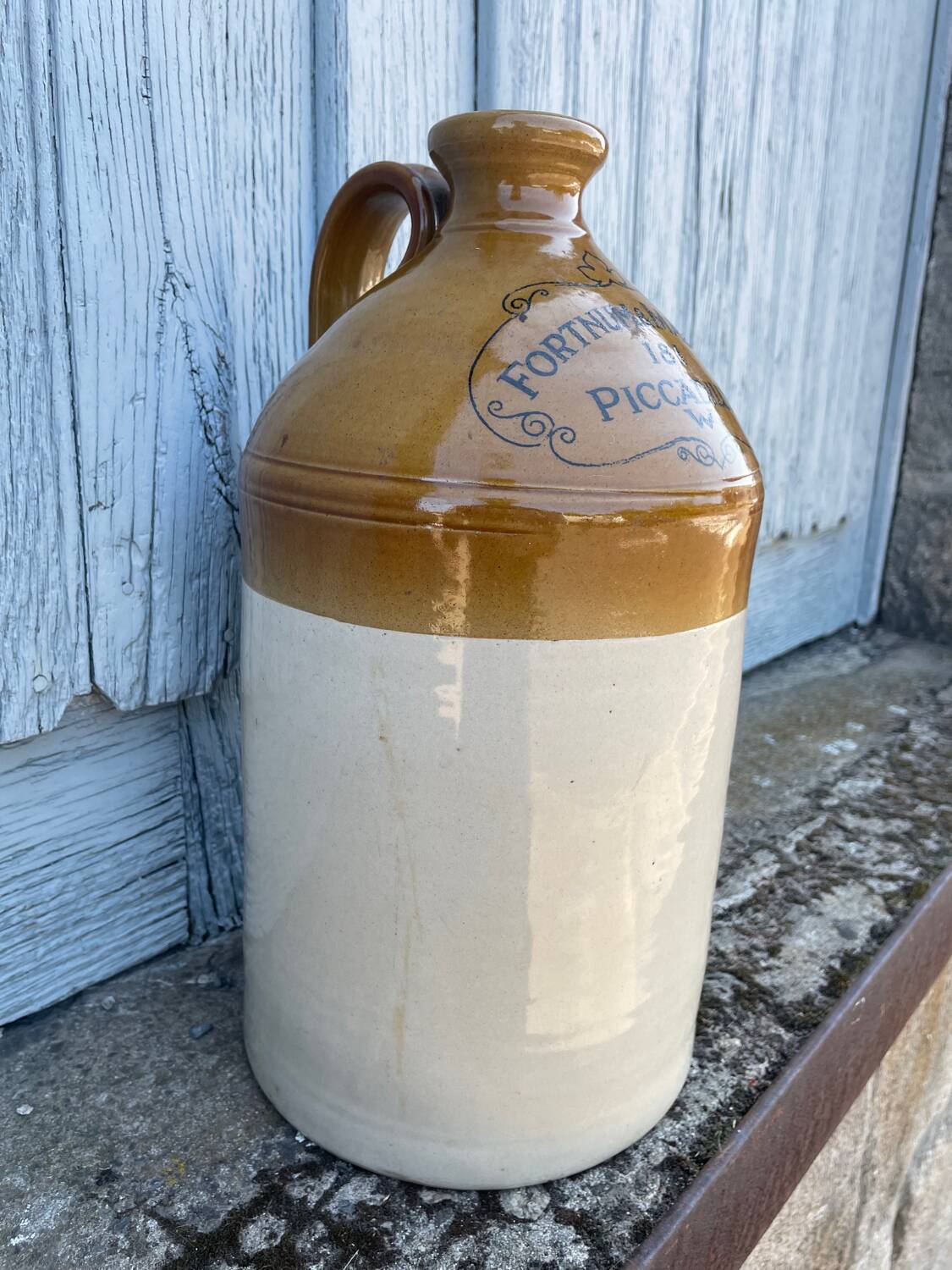 Old English stoneware jar or jug with a glazed finish.
