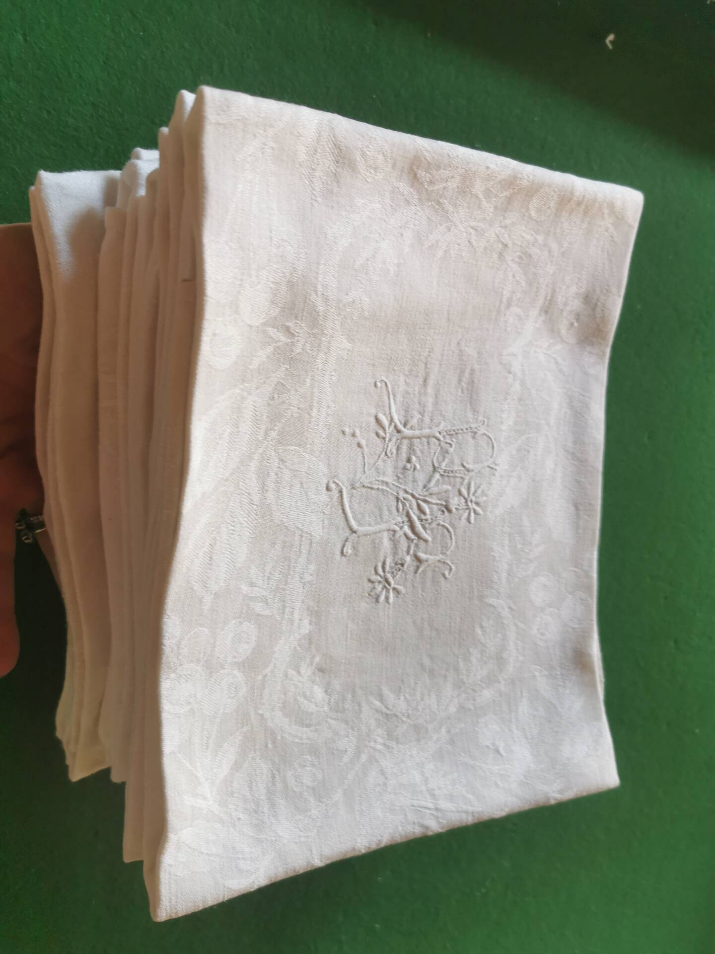 12 damask linen table napkins with an antique silk monogram from the 19th century.