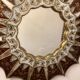 Miroir sunburst à fleurs année 1950