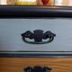 Chest of drawers with 5 drawers in solid dark wood and patinated blue.