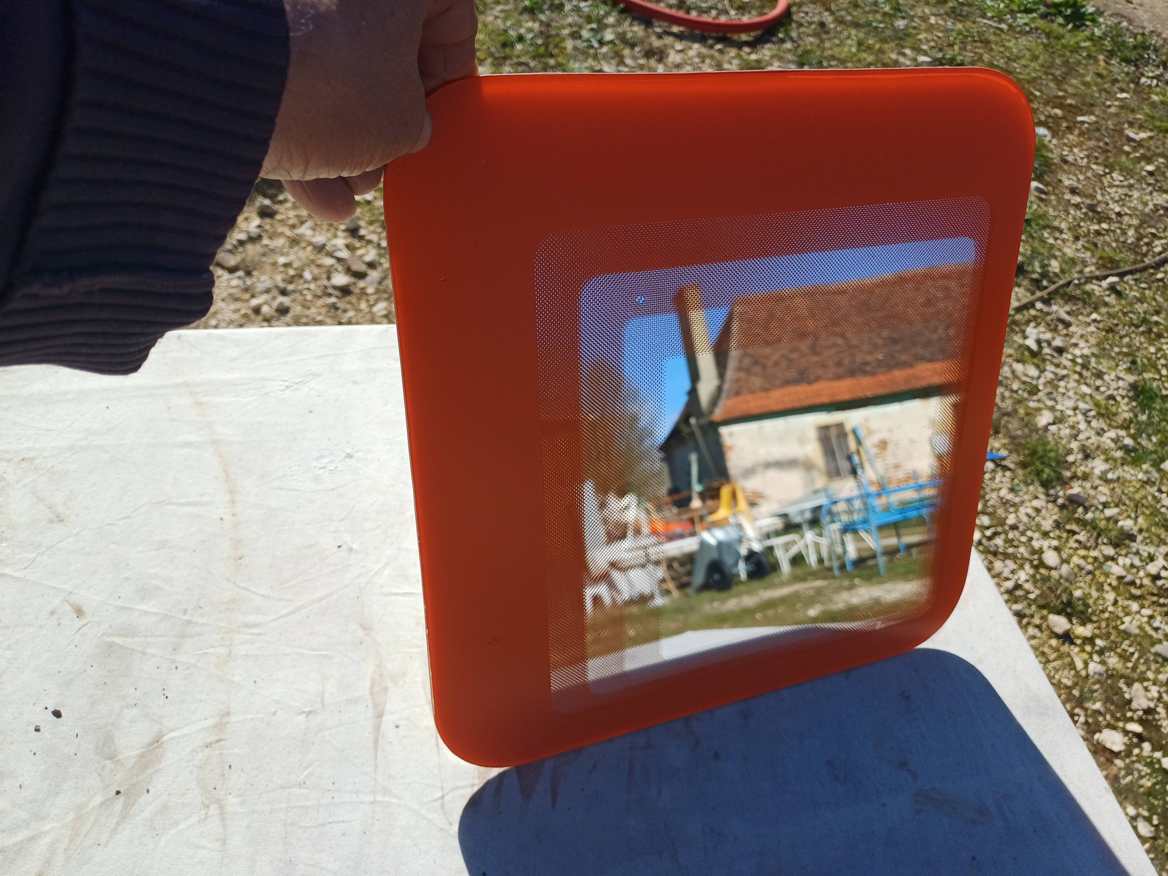 Vintage orange glass mirror
