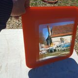 Vintage orange glass mirror