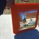 Vintage orange glass mirror