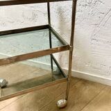 Glass and metal rolling table / serving trolley