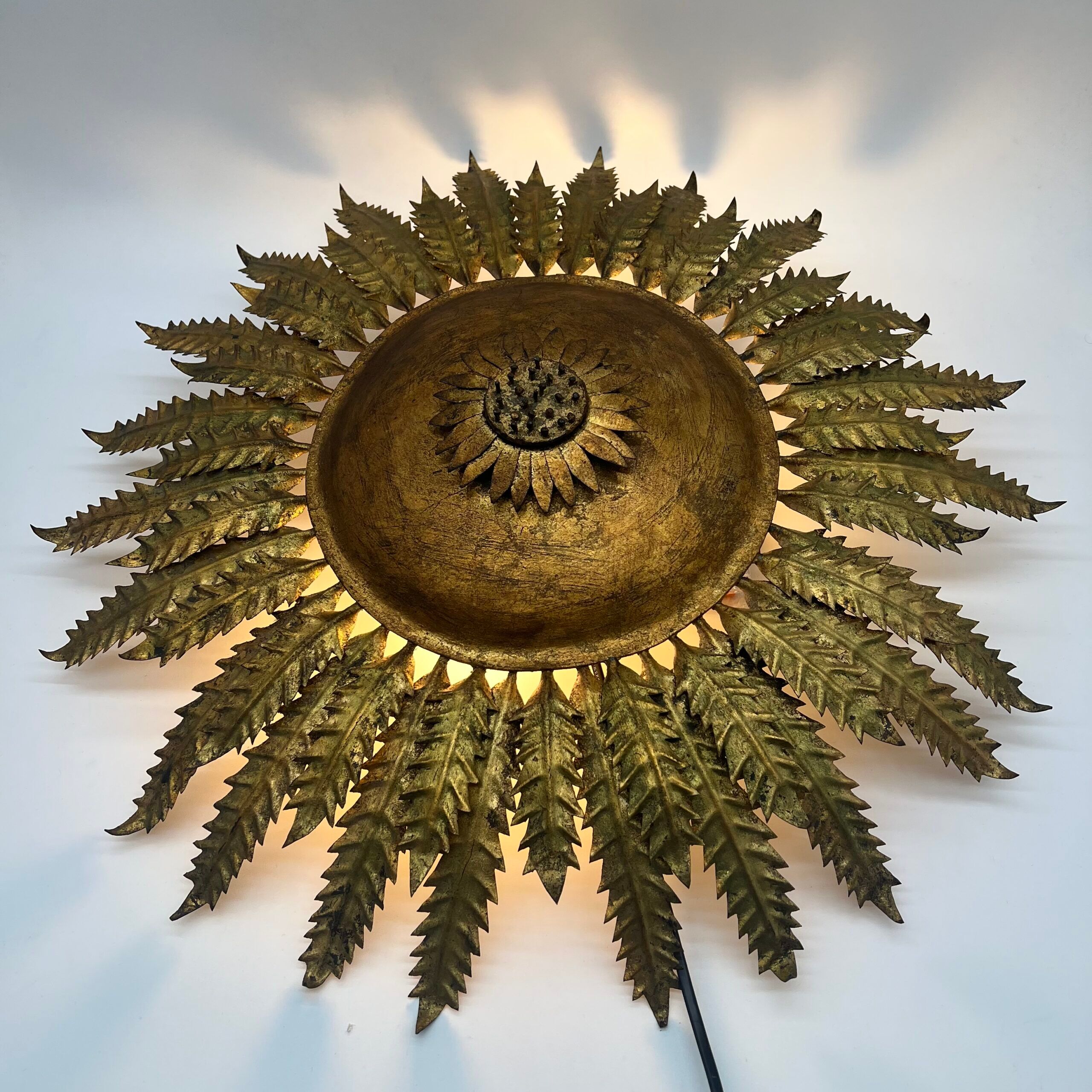 Large wall sconce "Sol" in gilded wrought iron – Spain, 1950s
