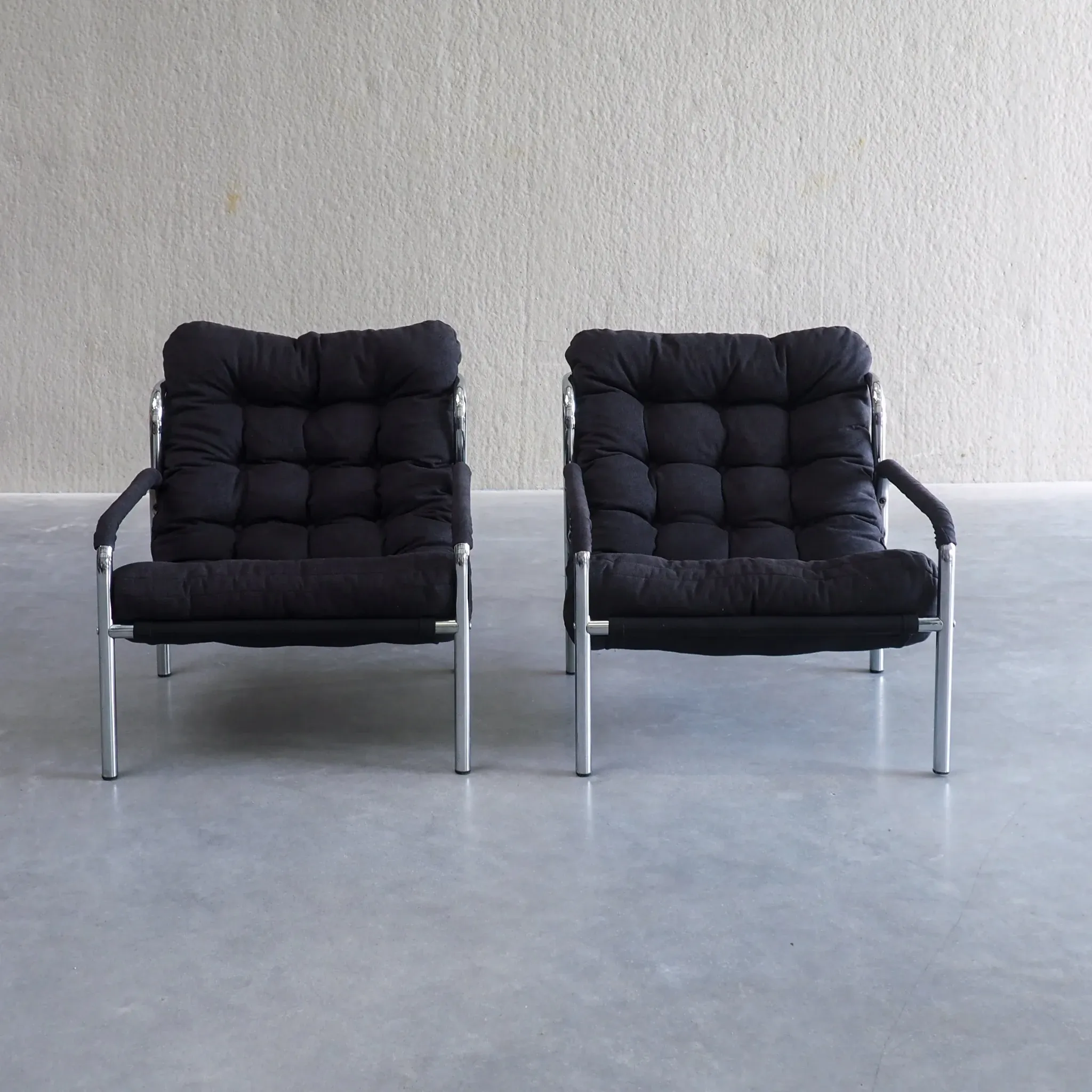 Pair of mid-century modern tubular lounge chairs