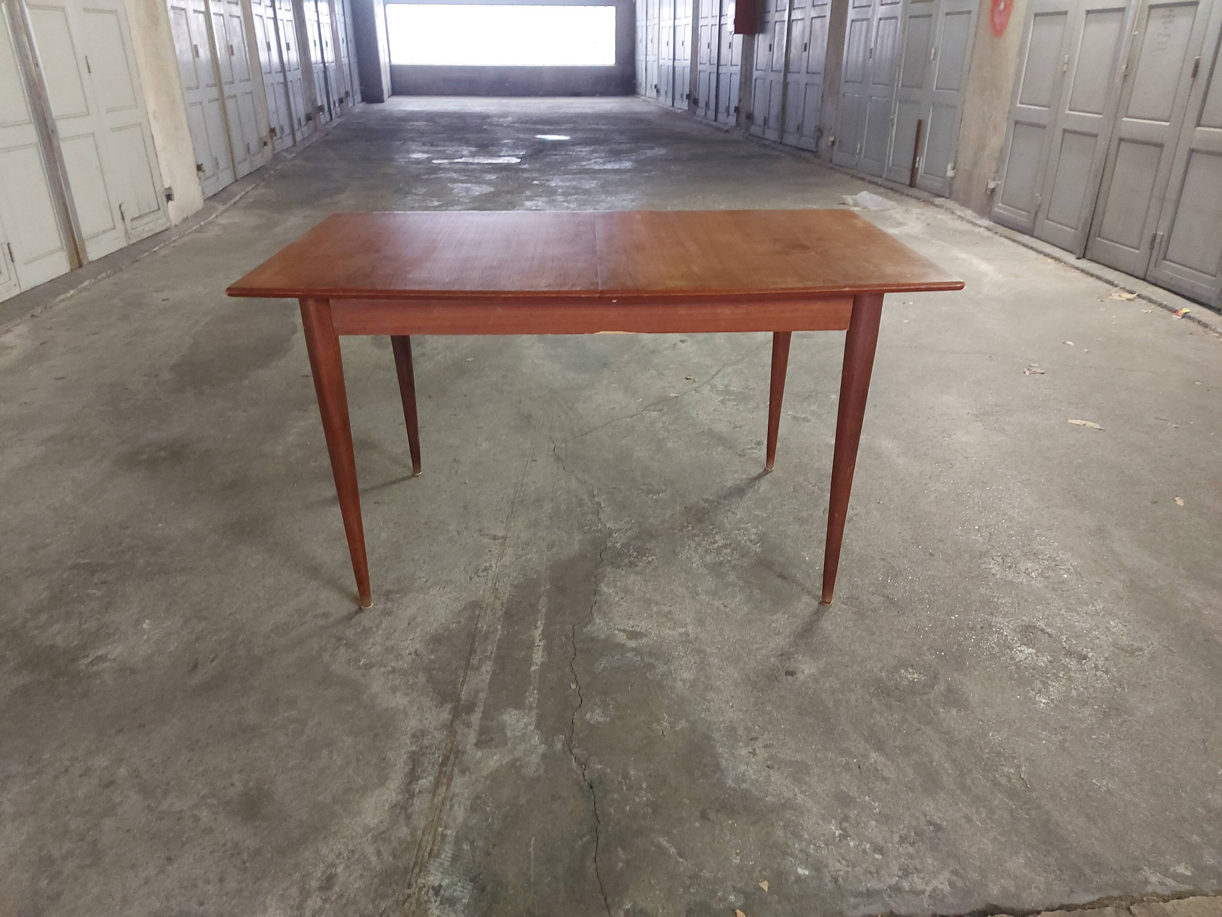 Scandinavian teak table with built-in extension