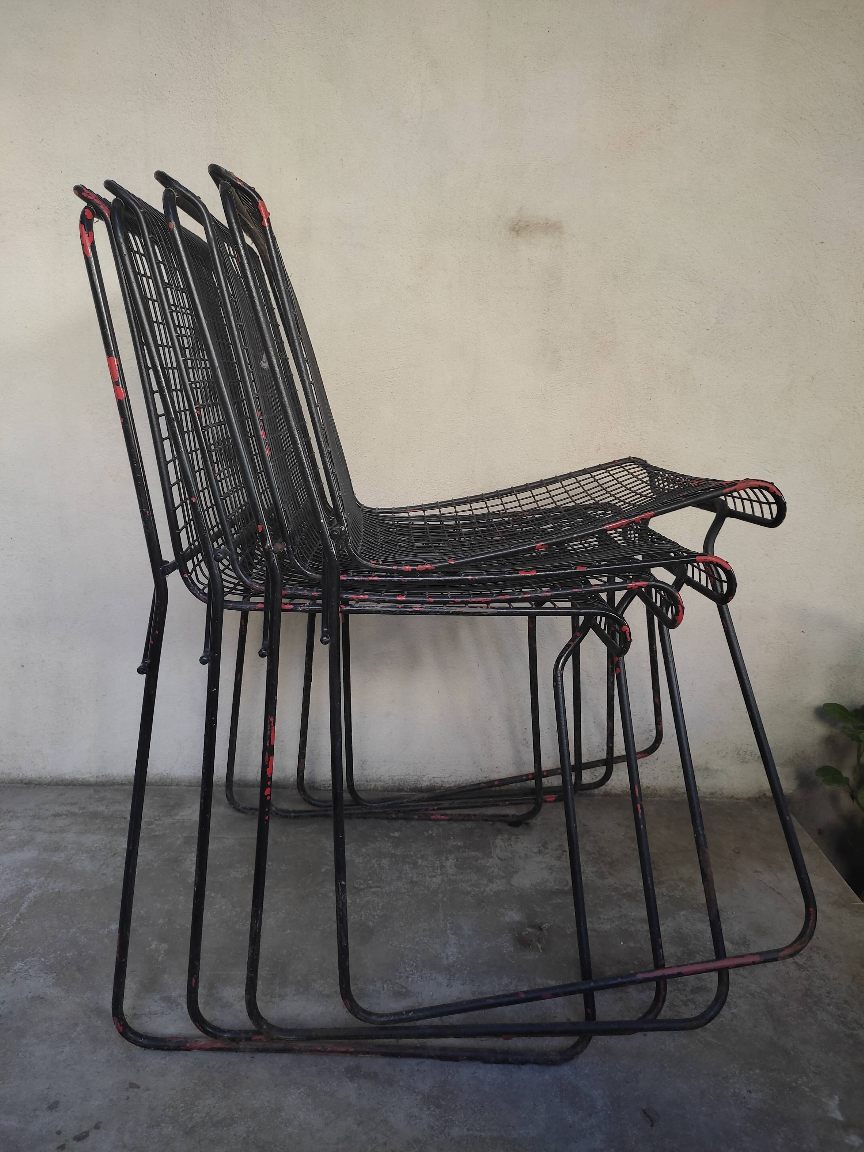 4 gridded metal chairs