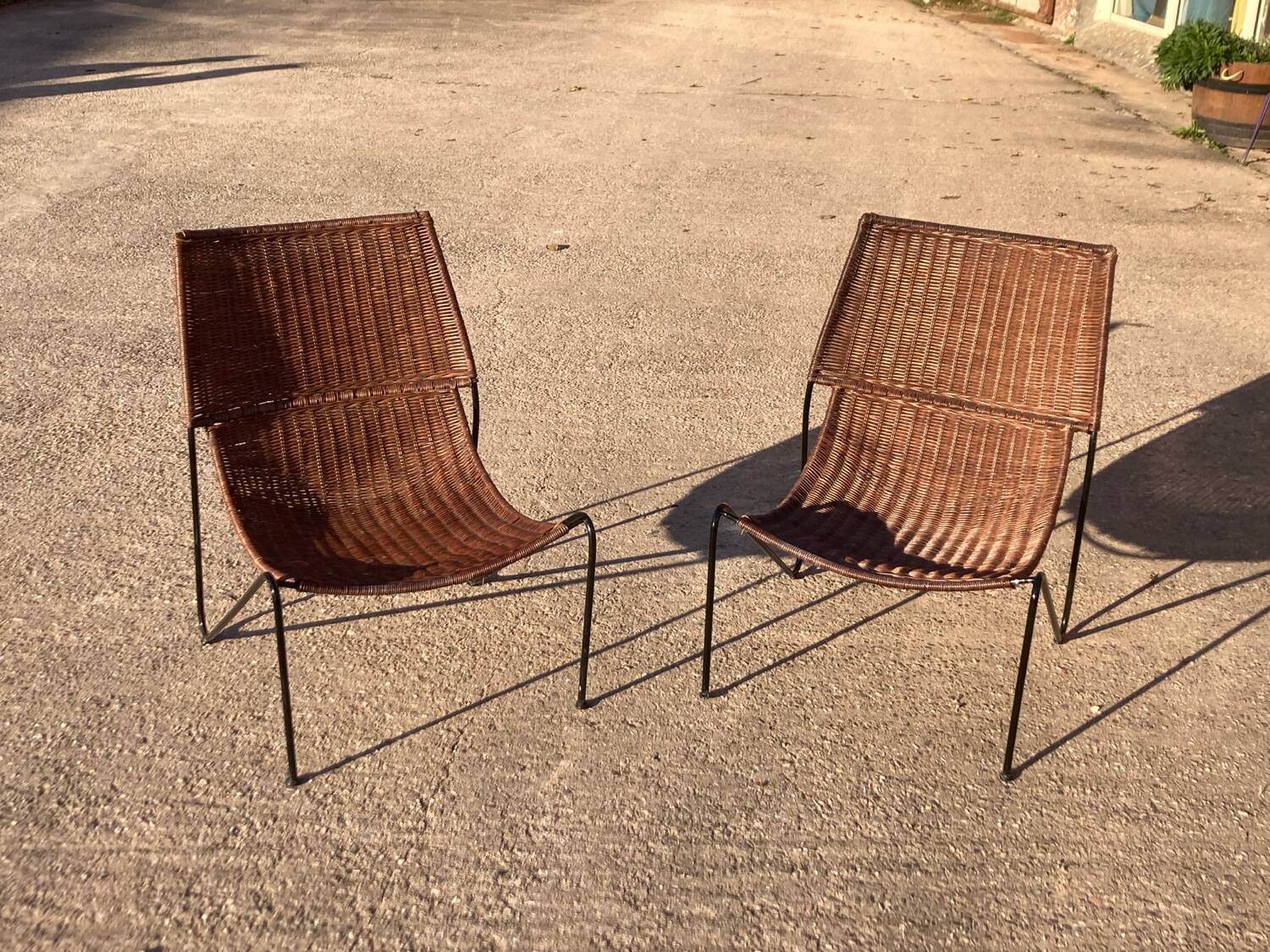 Pair of rattan and steel armchairs