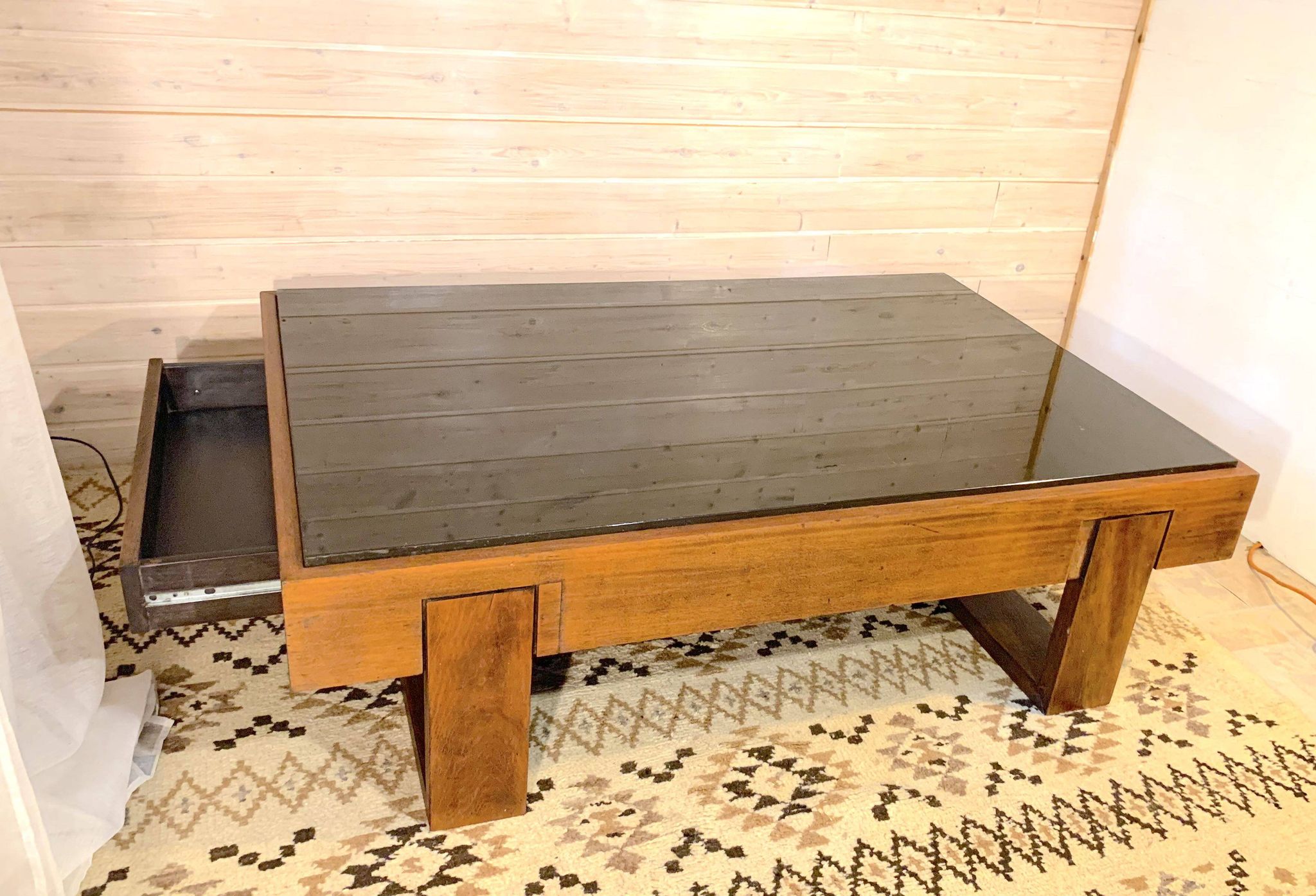 Rosewood coffee table, with black glass top, Brazil 1970