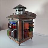 Copper lantern table lamp and 60s multicolored glasses