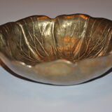 Empty-pocket flower in solid brass