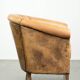 Vintage sheepskin club armchair in a light cognac colour