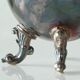 Neoclassical cup with a patinated and silvered copper base.