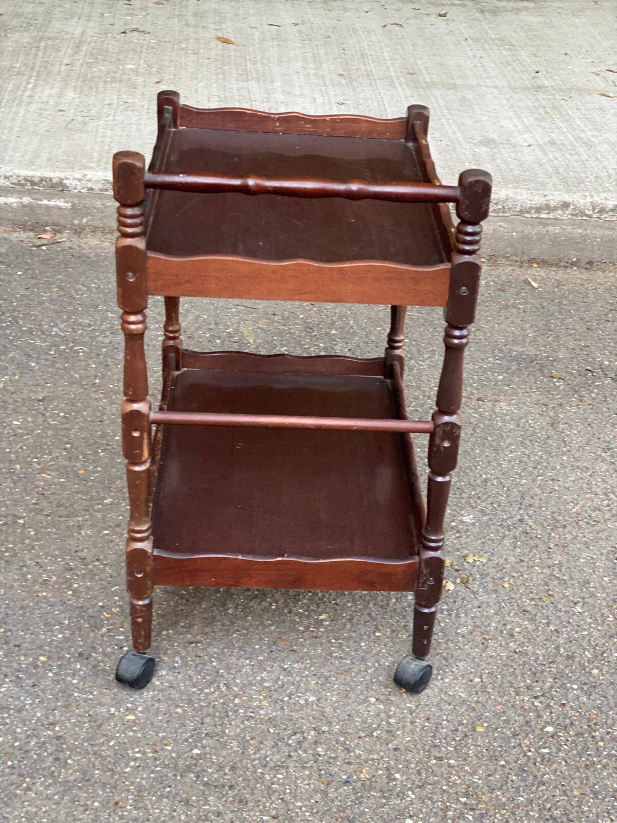 Solid wood serving trolley on wheels