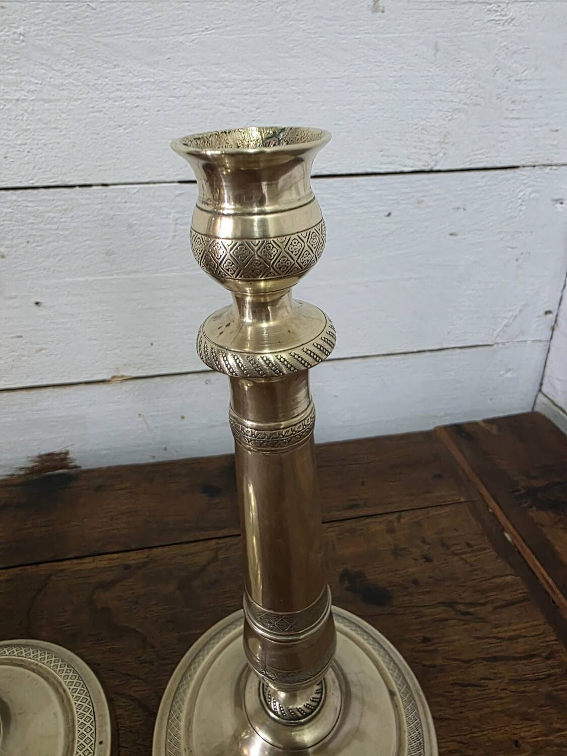 Antique pair of brass candlesticks