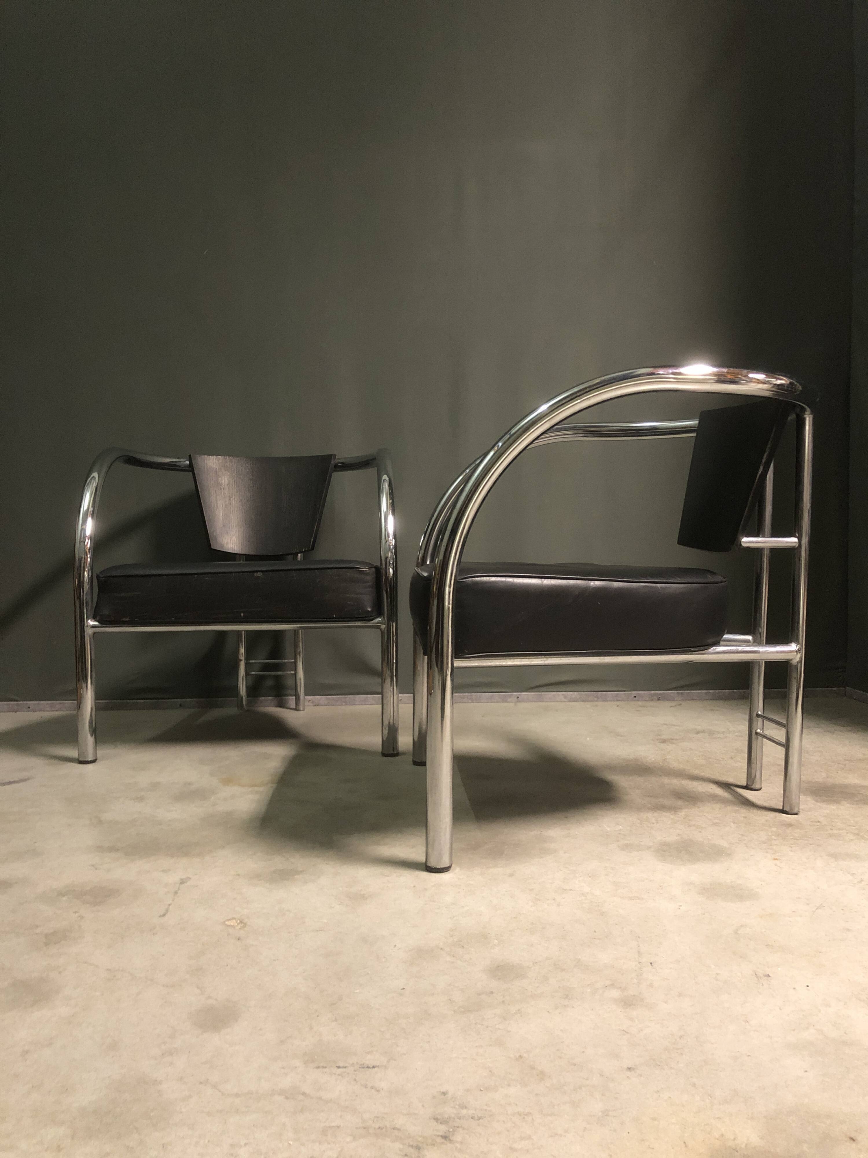 A pair of petite low armchairs by ronald cecil sportes for lumen center, 1987