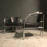 A pair of petite low armchairs by ronald cecil sportes for lumen center, 1987