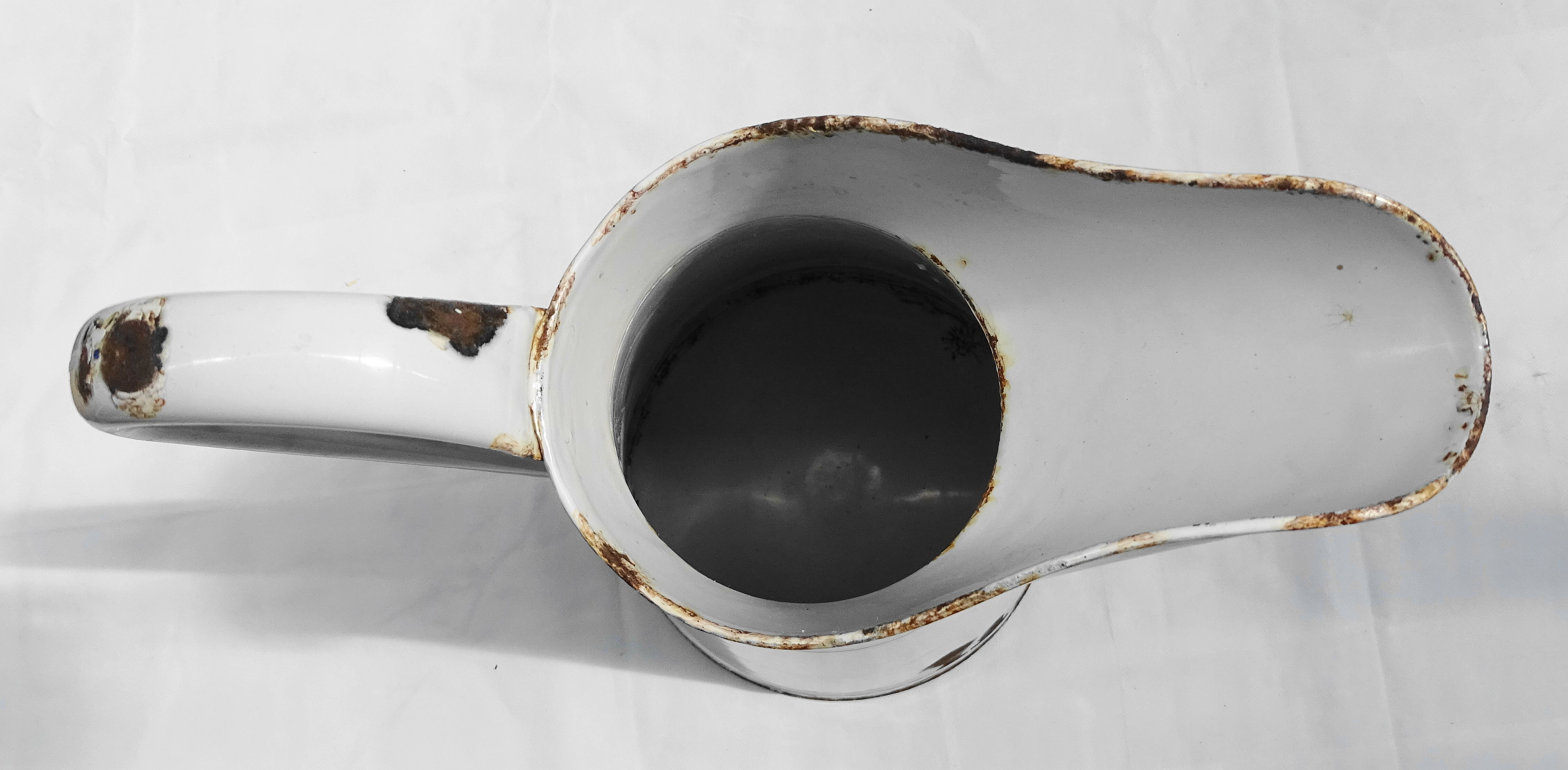 White enamelled iron broc